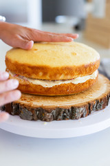 putting layer on top of cake