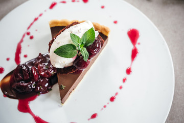 Chocolate Custard Tart Dessert with Concord Grape Compote and Vanilla Chantilly Cream