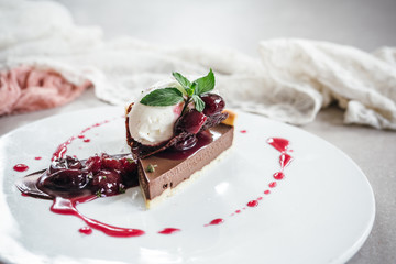 Chocolate Custard Tart Dessert with Concord Grape Compote and Vanilla Chantilly Cream