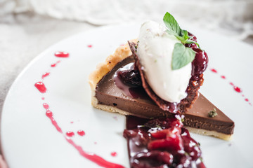 Chocolate Custard Tart Dessert with Concord Grape Compote and Vanilla Chantilly Cream