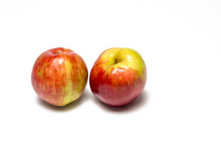 Fototapeta na wymiar Two Gravensteiner apples isolated on white background.