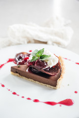 Chocolate Custard Tart Dessert with Concord Grape Compote and Vanilla Chantilly Cream