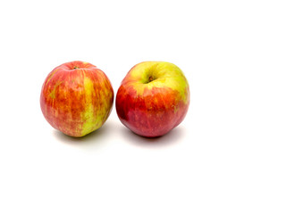 Two Gravensteiner apples isolated on white background.