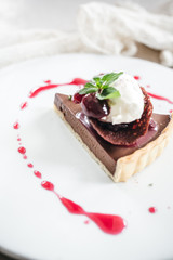 Chocolate Custard Tart Dessert with Concord Grape Compote and Vanilla Chantilly Cream