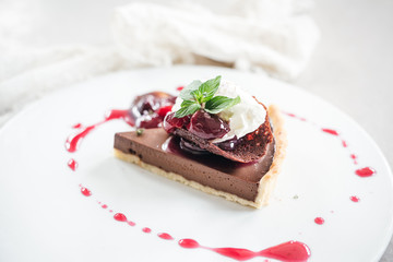 Chocolate Custard Tart Dessert with Concord Grape Compote and Vanilla Chantilly Cream