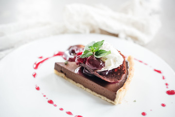 Chocolate Custard Tart Dessert with Concord Grape Compote and Vanilla Chantilly Cream