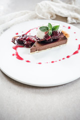 Chocolate Custard Tart Dessert with Concord Grape Compote and Vanilla Chantilly Cream