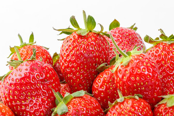 beautiful and ripe red strawberries on a white background