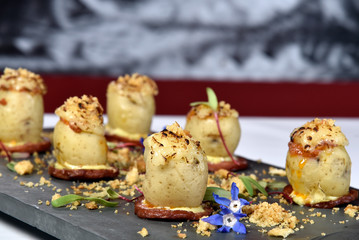 potato stuffed with meat and cheese au gratin