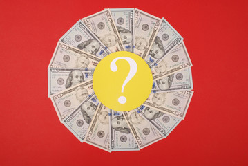 Question mark on mandala kaleidoscope from money.