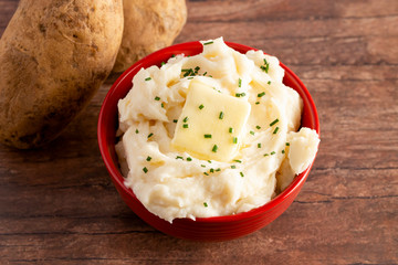 Bowl of Creamy Mashed Potatoes with Chives on Top