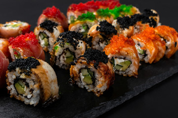 Set of traditional japanese food on a dark background.