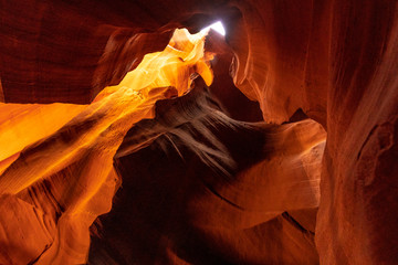 Cave of red, orange and purple colors in the Upper Antelope Canyon in the town of Page, Arizona. United States