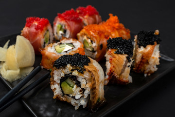 Philadelphia roll sushi with salmon, prawn, avocado, cream cheese. Sushi menu. Japanese food.
