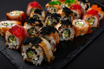 Set of traditional japanese food on a dark background.