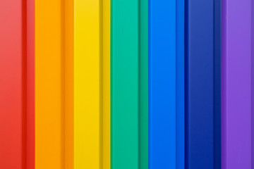 Obraz premium Multiples vertical color stripes on a metal wall - flawlessly painted with lovely vivid colors