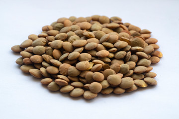 macro of lentils on a white background