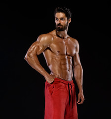 Fototapeta na wymiar Handsome Muscular Men Posing and Flexing Muscles