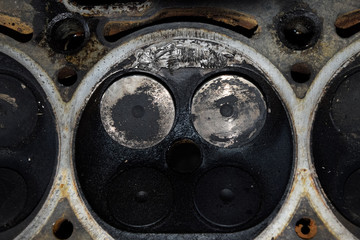 Valve in a deposit on the removed cover of the engine valve box.