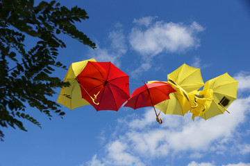 colorfull umbrella in the air as advertising material