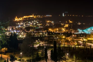 Foto op Plexiglas Night view of old Tbilisi. Narikala Fortress and other landmarks of the city. © k_samurkas