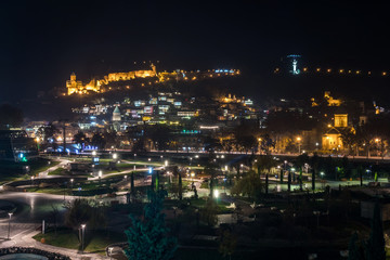 Night view of old Tbilisi. Narikala Fortress and other landmarks of the city.
