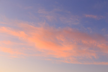 Blue sky and pink clouds at sunset