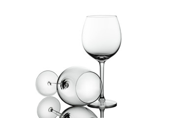 Clean Empty wine glasses with reflections on white background. Alcohol beverage card backdrop.