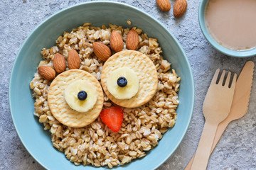 Fototapeta premium Owl bird - funny porridge for children. Breakfast for children.