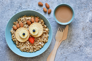 Owl bird - funny porridge for children. Breakfast for children.