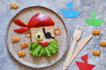 Funny food for children - pirate sandwich. Lunch for children.