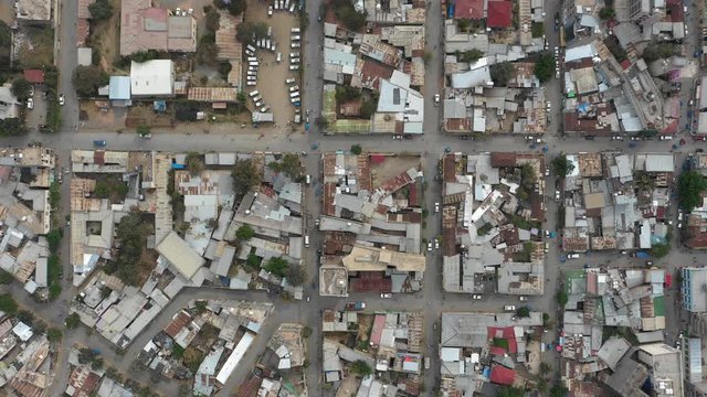 Abstract Overhead Drone Shot Of Grid Structure With Traffic Driving Through Streets Of Mek'ele, The Second Largest City In Ethiopia