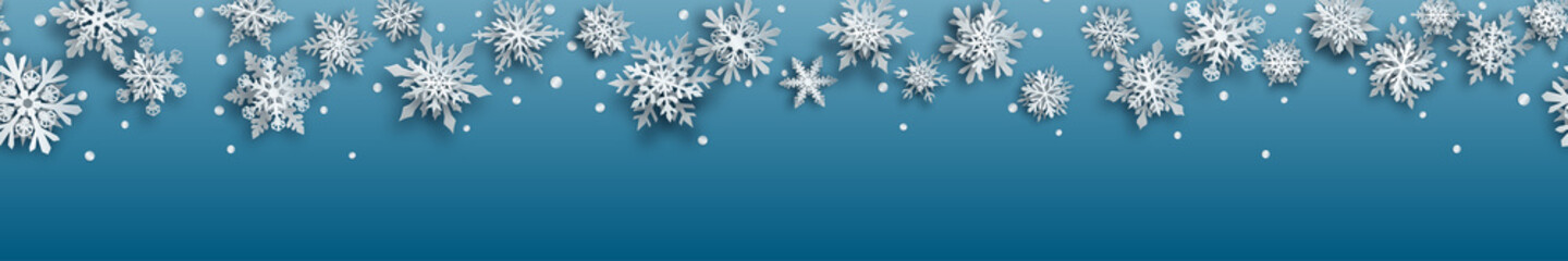 Christmas banner of white complex paper snowflakes with soft shadows on light blue background. With horizontal repetition