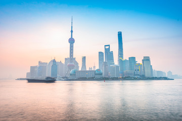 Shanghai skyline. Pudong New Area and Huangpu River. Located in The Bund, Shanghai, China.