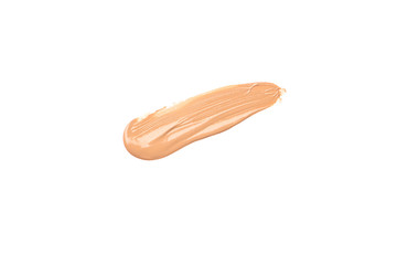 Bright beige smear of foundation diagonal stroke.