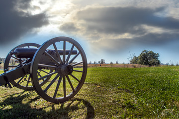 Civil war canon on the Gettysburg Battlefield near sunset