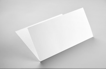 Blank folded letterhead over gray background