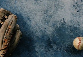 Grunge baseball background with ball and glove.