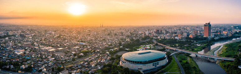 Aerial drone photo - Sunrise over the city of Maebashi, Gunma Prefecture.  Japan, Asia