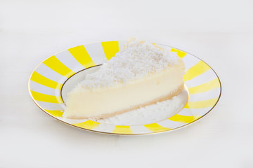 delicious cheesecake with coconut on  plate