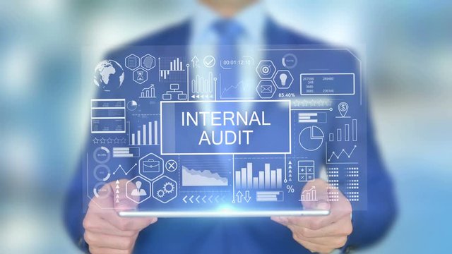 Internal Audit, Businessman with Hologram Concept