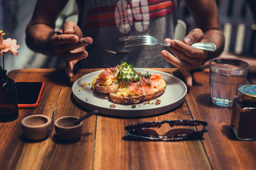 handsome beard man hair, brutal macho, dine in the restaurant, eating delicious served hot dish, Italian pasta, spices, fine dining, europe, food, Kef, lunch,breakfast and dinner in the cafe,smoothie
