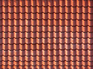 Roofing texture. Red corrugated tile element of roof. Seamless pattern. close up of red roof texture tile.