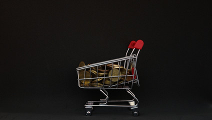 supermarket empty shopping trolley cart  and black background                