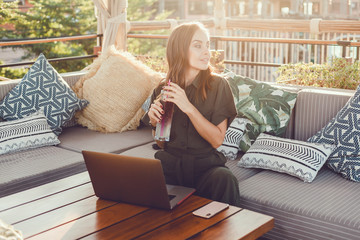 Pretty Young Beauty Woman Using Laptop in cafe, outdoor portrait business woman, hipster style, internet, smartphone, office, Bali Indonesia, holding, mac OS, manager, freelancer 