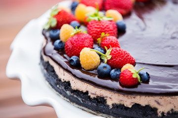 Cheese cake with chocolate and organic berries