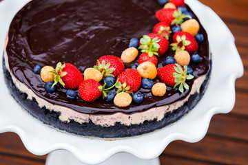 Cheese cake with chocolate and organic berries
