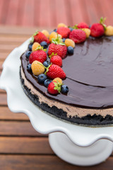 Cheese cake with chocolate and organic berries