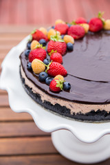 Cheese cake with chocolate and organic berries