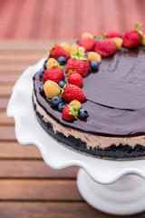 Cheese cake with chocolate and organic berries